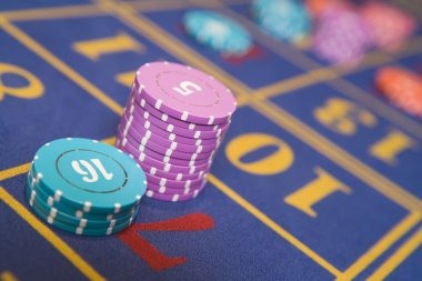 Live blackjack table with multiple player positions and dealer camera angles